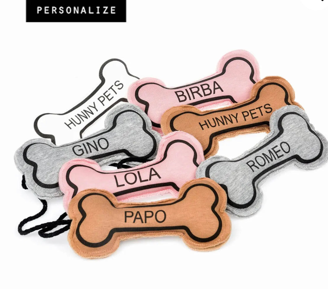 Soft fabric bone customizable with your pet's name. Luxury accessories for dogs made in Italy.