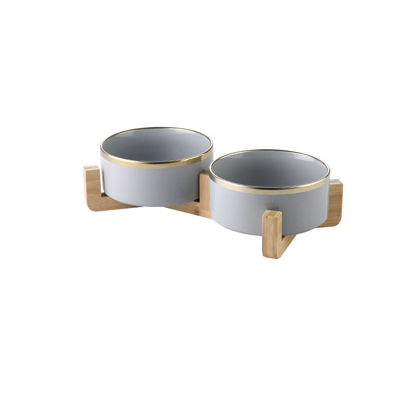 Elegant ceramic bowls with golden rim for water and baby food. Luxury chic accessories for dogs, cats and pets.