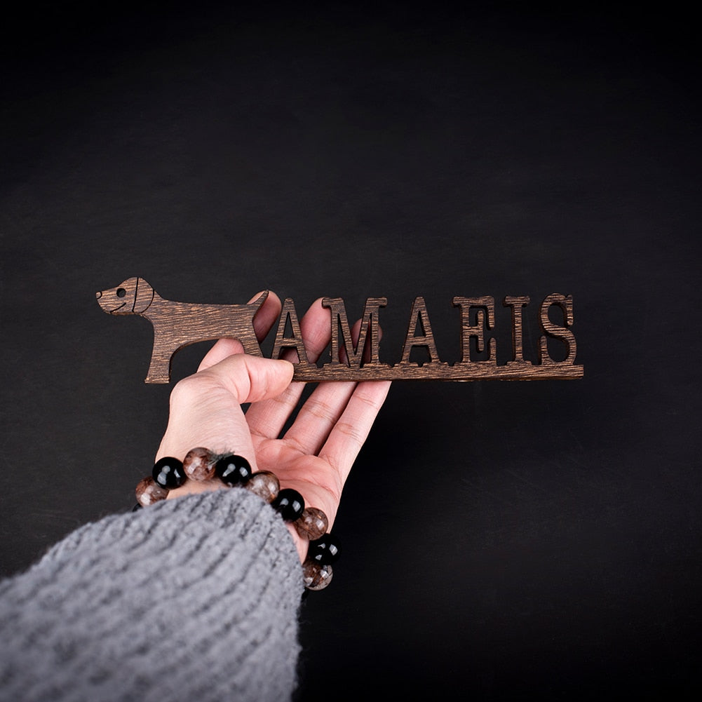Delicious hand-carved wooden decoration for you or as a gift, customizable with your pet's name.