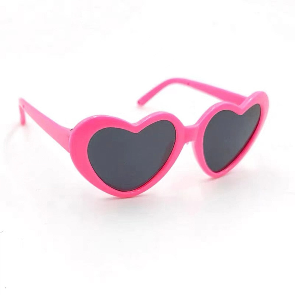 Wonderful sunglasses with heart-shaped lenses. Luxury chic accessories and clothing for dogs, cats and pets.