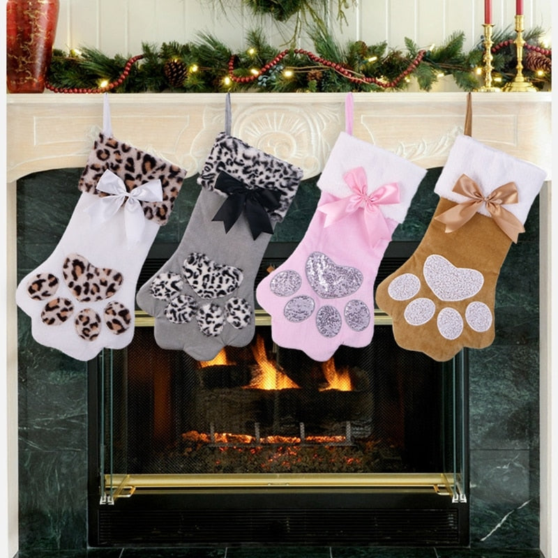 Plush sock to hang on the Christmas tree in the shape of a cat's paw.