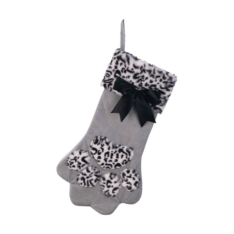 Plush sock to hang on the Christmas tree in the shape of a cat's paw.